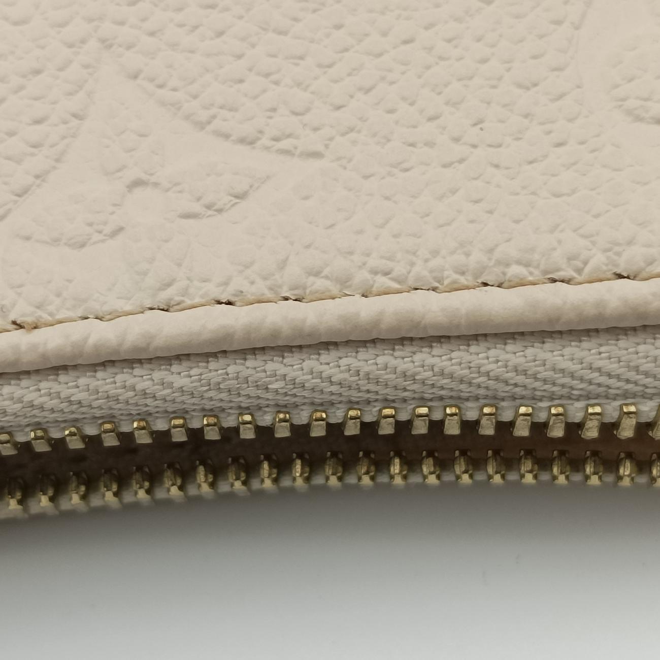 Easy PouchCrème WhiteEmbossed MonogramM81066ICチップイージーポーチクレームホワイト モノグラム アンプラントM81066ICチップ