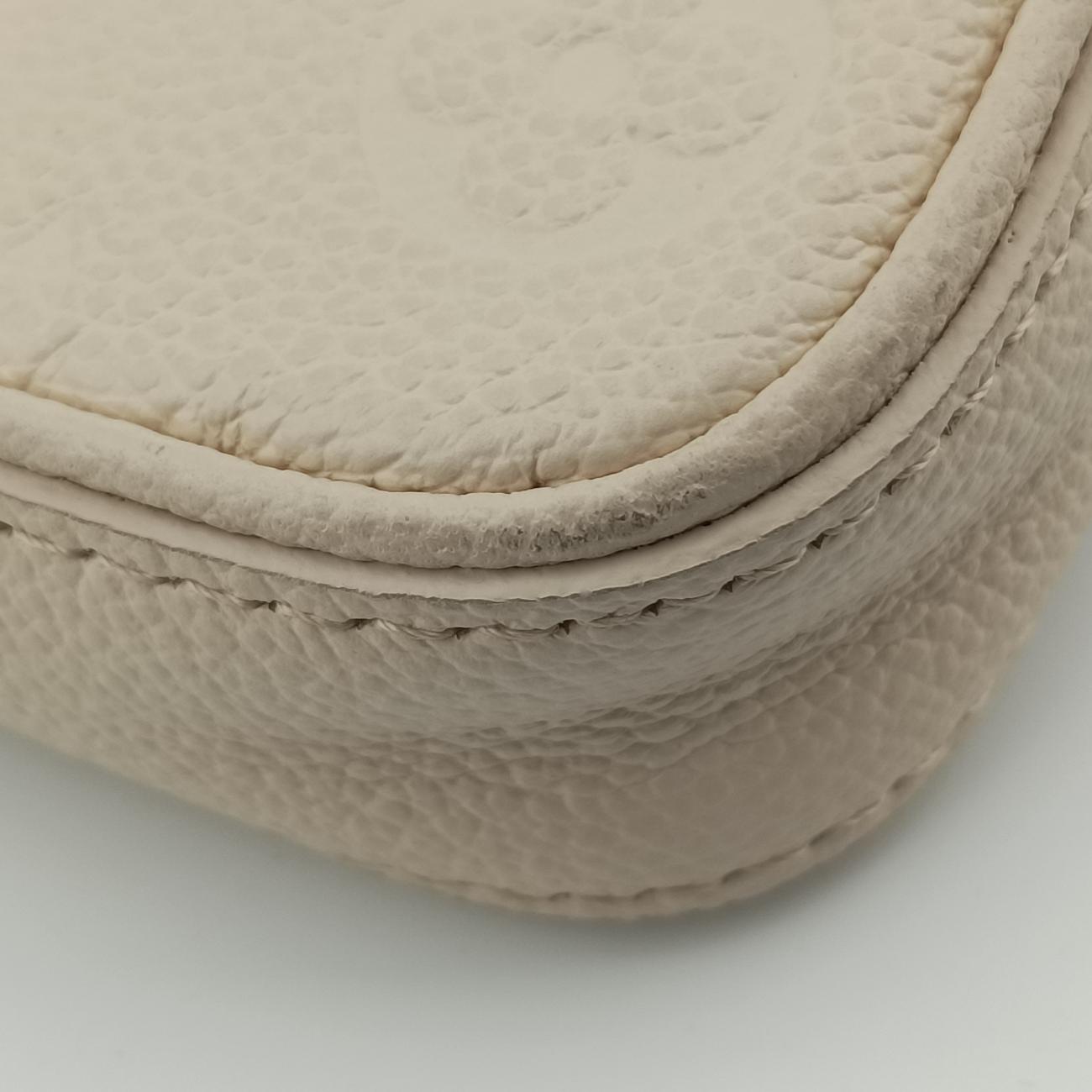 Easy PouchCrème WhiteEmbossed MonogramM81066ICチップイージーポーチクレームホワイト モノグラム アンプラントM81066ICチップ