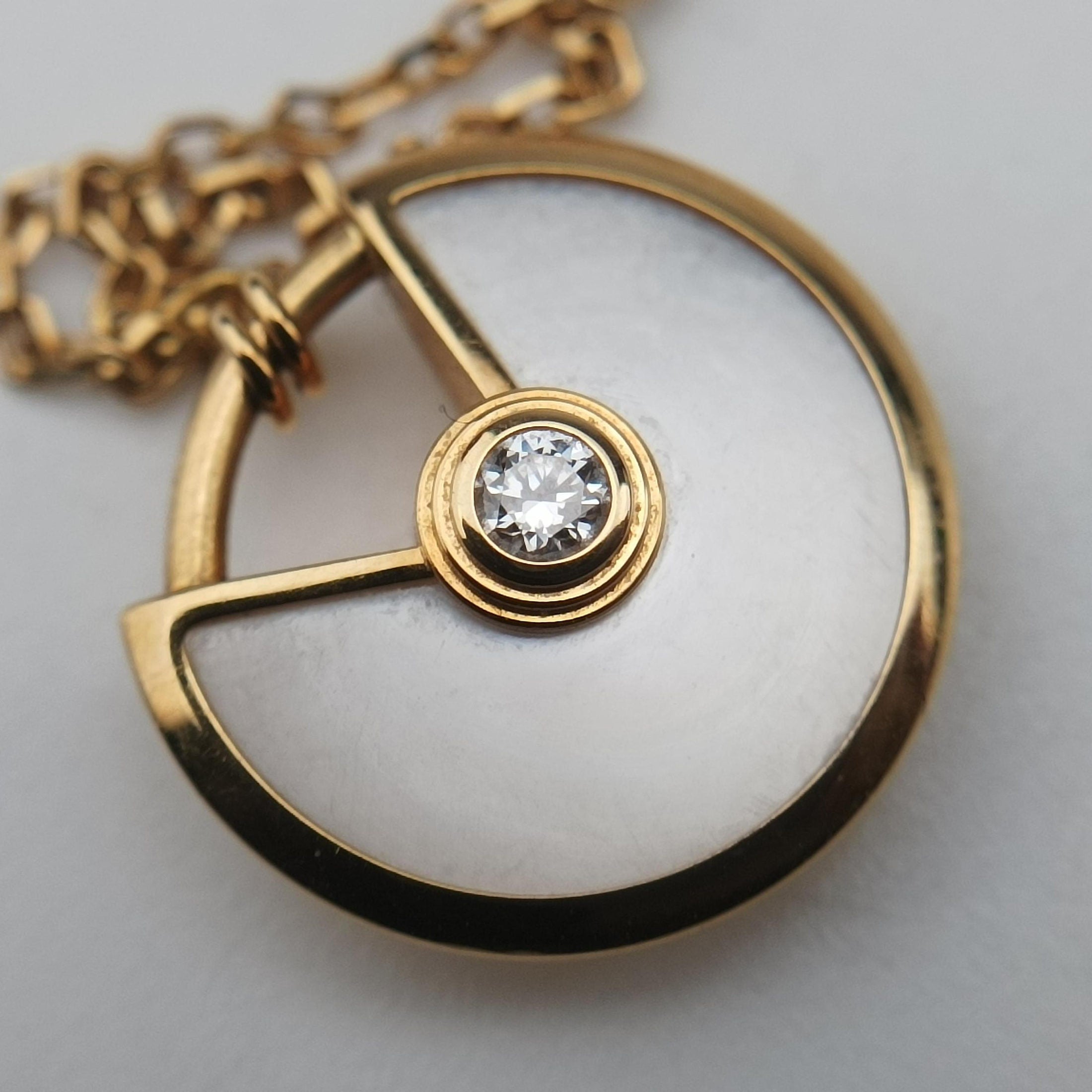Amulette de Cartier Gold×White AU750 B3047100 KTG470カルティエ アミュレット ゴールド×ホワイト AU750 B3047100 KTG470