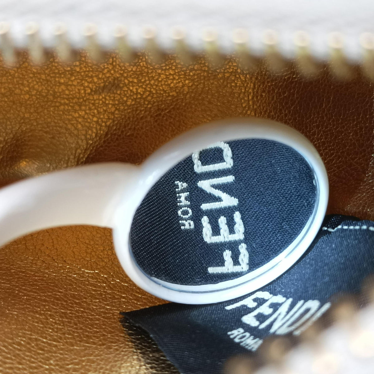 Secondhand Fendi Nano Fendigraphy White Leather 7AS089 clutchbag | stylenewstar