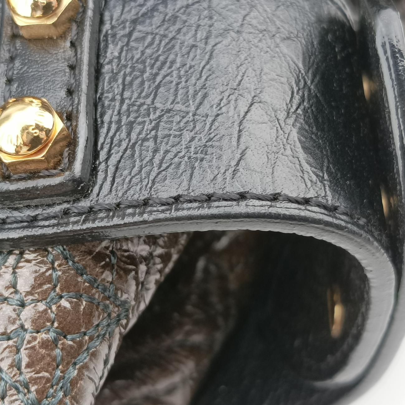 BikerBrownMonogram MotardｘLeatherM95595FO0097バイカーブラウンモノグラムモタードキャンバスｘレザーM95595FO0097