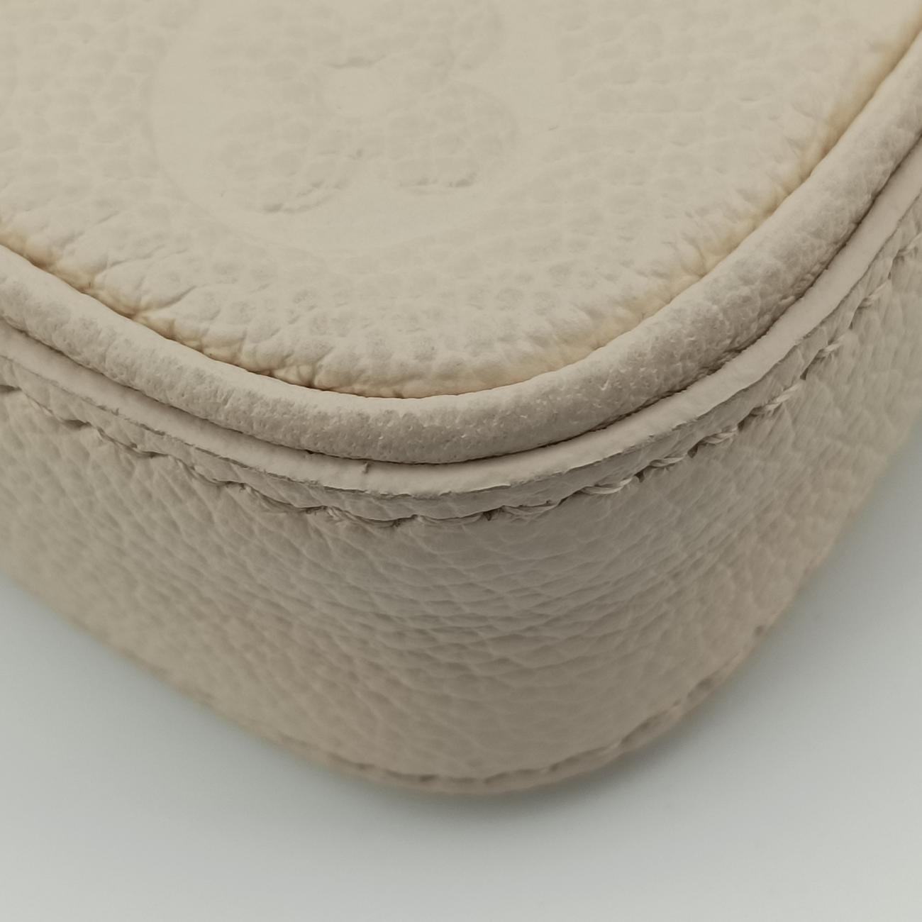 Easy PouchCrème WhiteEmbossed MonogramM81066ICチップイージーポーチクレームホワイト モノグラム アンプラントM81066ICチップ