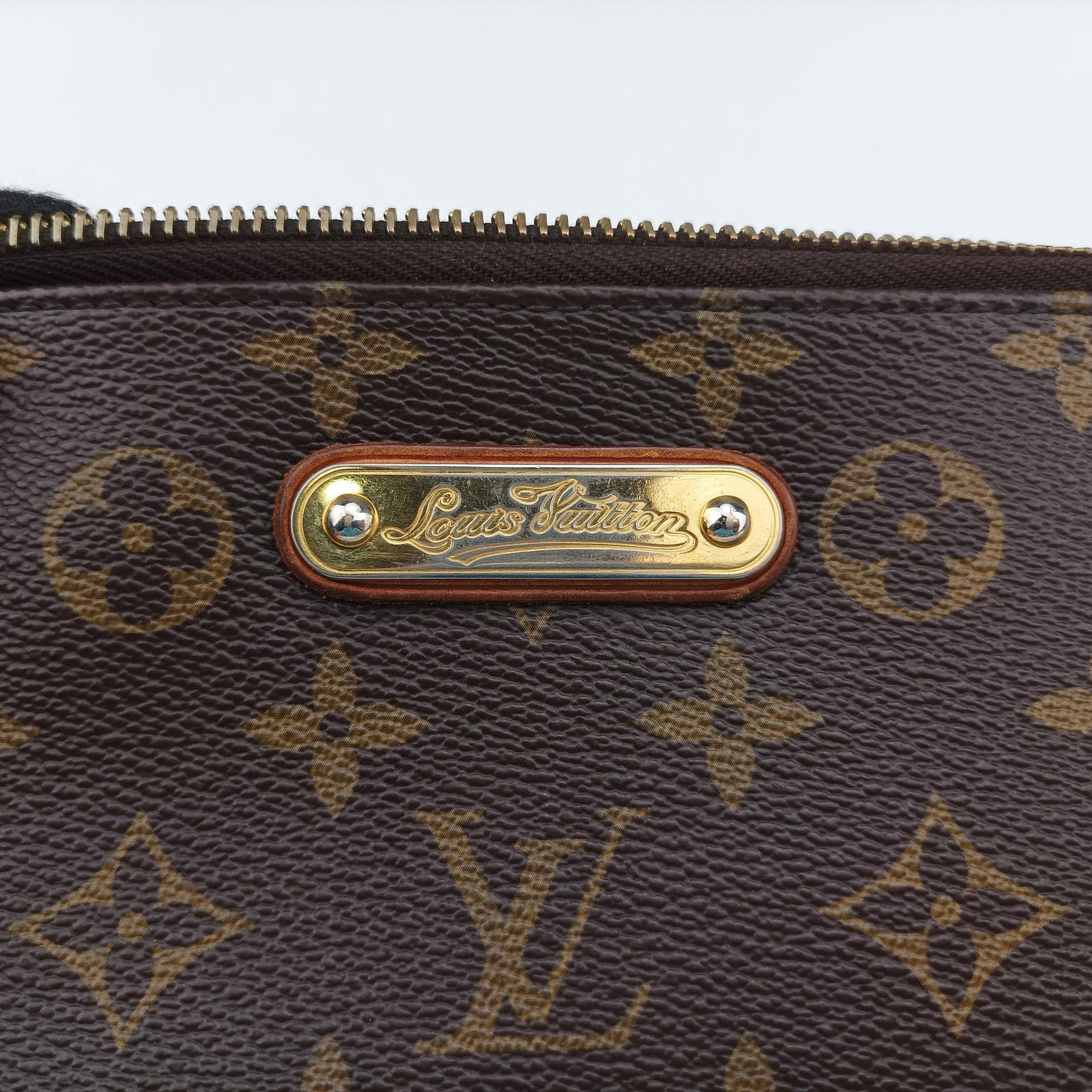 Pochette Mila MM brown Monogram Canvas M60094 AA1190ポシェット ミラ MM モノグラム/ブラウン モノグラムキャンバス M60094 AA1190