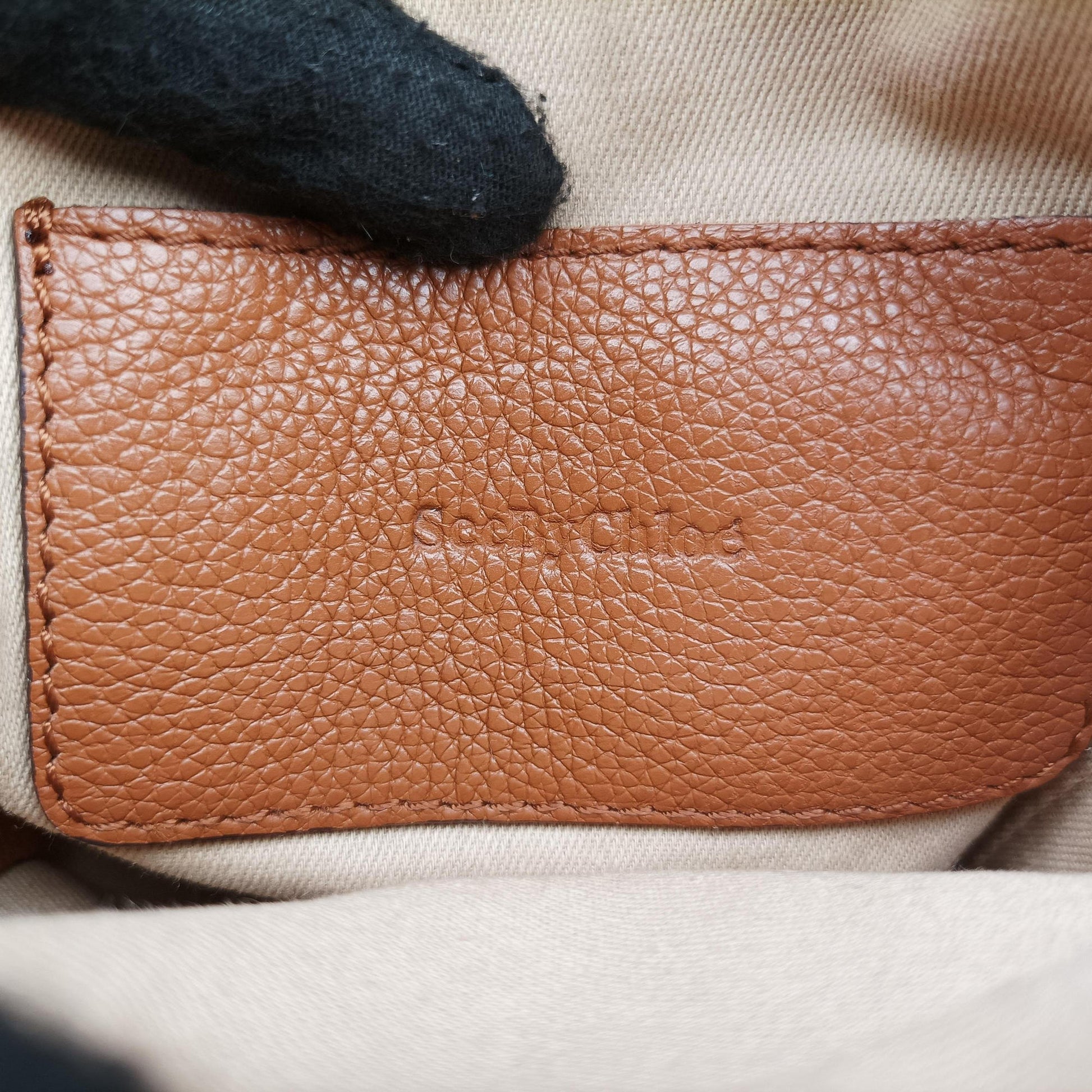 Joan Brown Suede × Leather 03-20-86585リボットホースヘッドフラップ ブラウン スエード × レザー ジョアン 03-20-86585