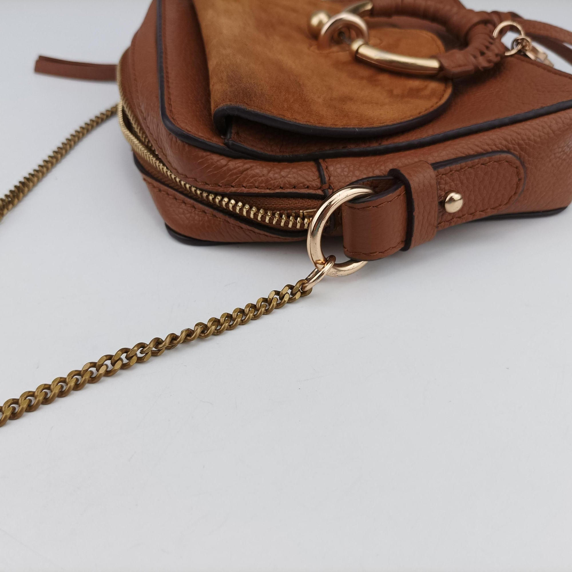 Joan Brown Suede × Leather 03-20-86585リボットホースヘッドフラップ ブラウン スエード × レザー ジョアン 03-20-86585