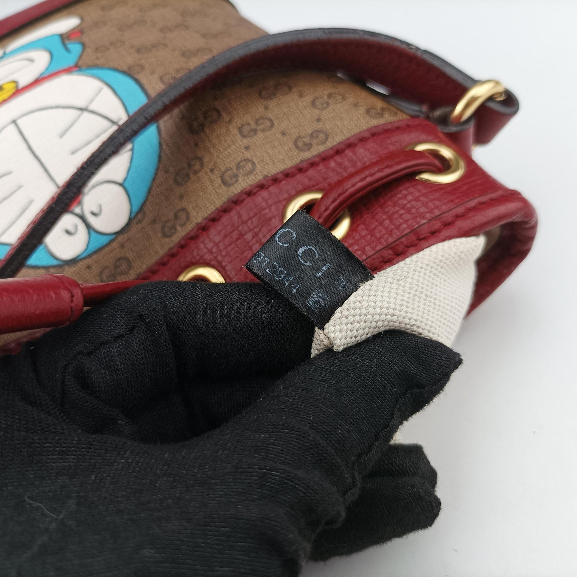 Doraemon collaboration Brown×Red×Multi PVC coated canvas×Leather 647801 G033912944ドラえもんコラボ ブラウン×レッド×マルチ PVCコーティングキャンバス×レザー 647801 G033912944