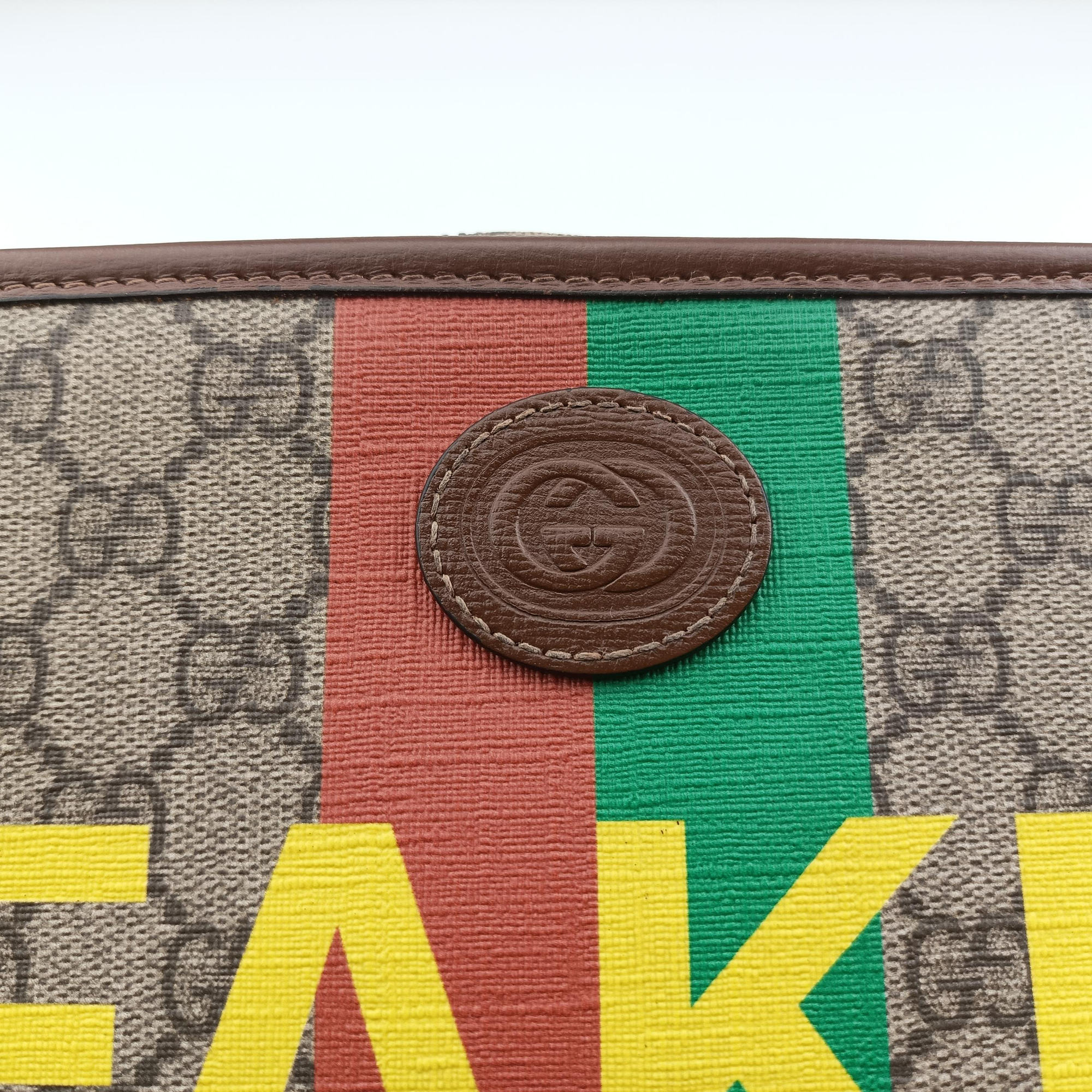 Vintage Gucci Fake/Not GG Supreme Brown PVC coated canvas 636243 clutchbag | stylenewstar