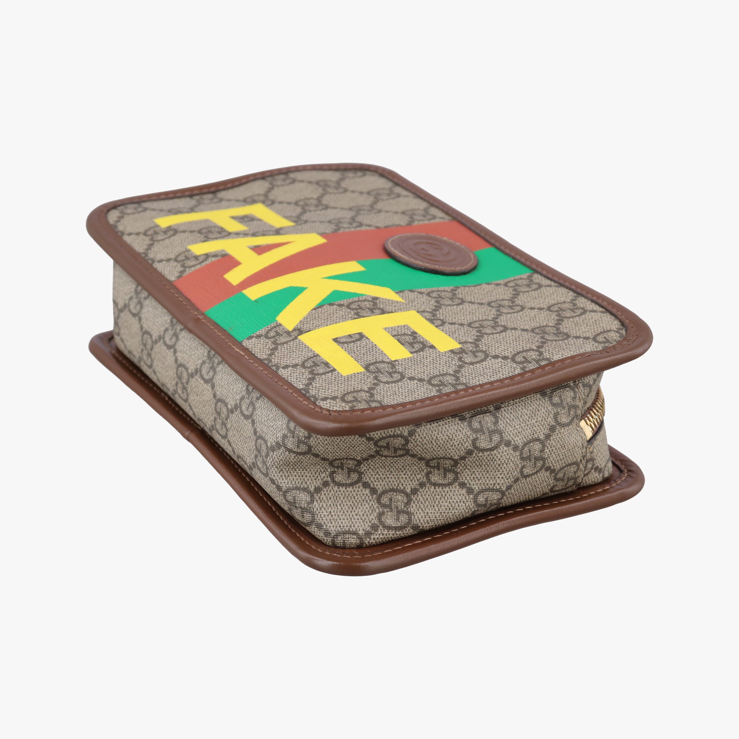 Vintage Gucci Fake/Not GG Supreme Brown PVC coated canvas 636243 clutchbag | stylenewstar