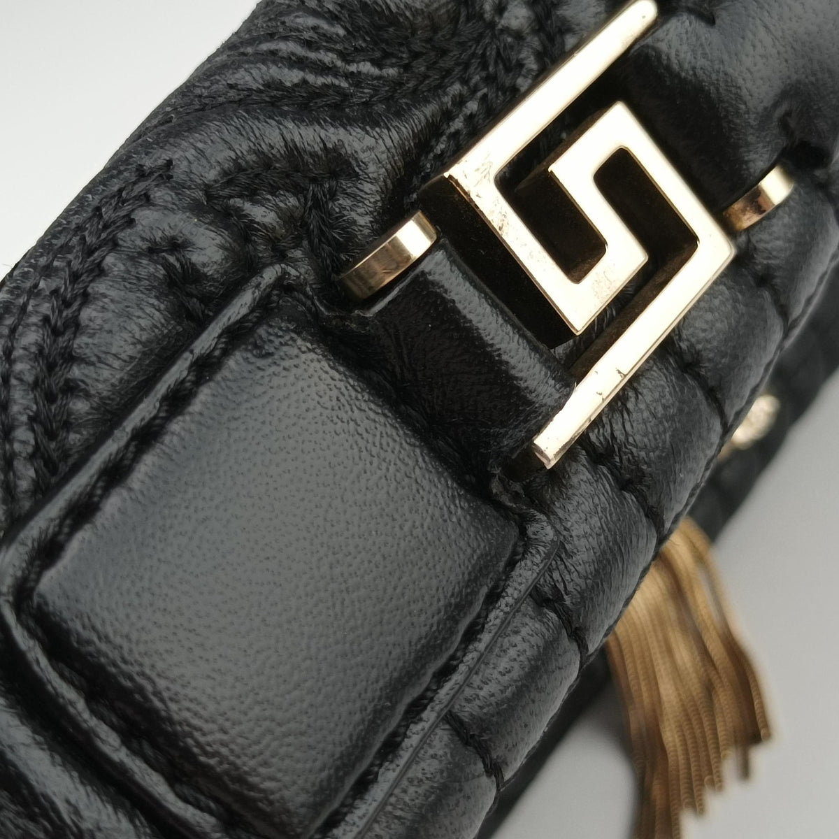 Secondhand VERSACE Embossed Leather Talia Vanitas Black Leather  shoulderbag | stylenewstar