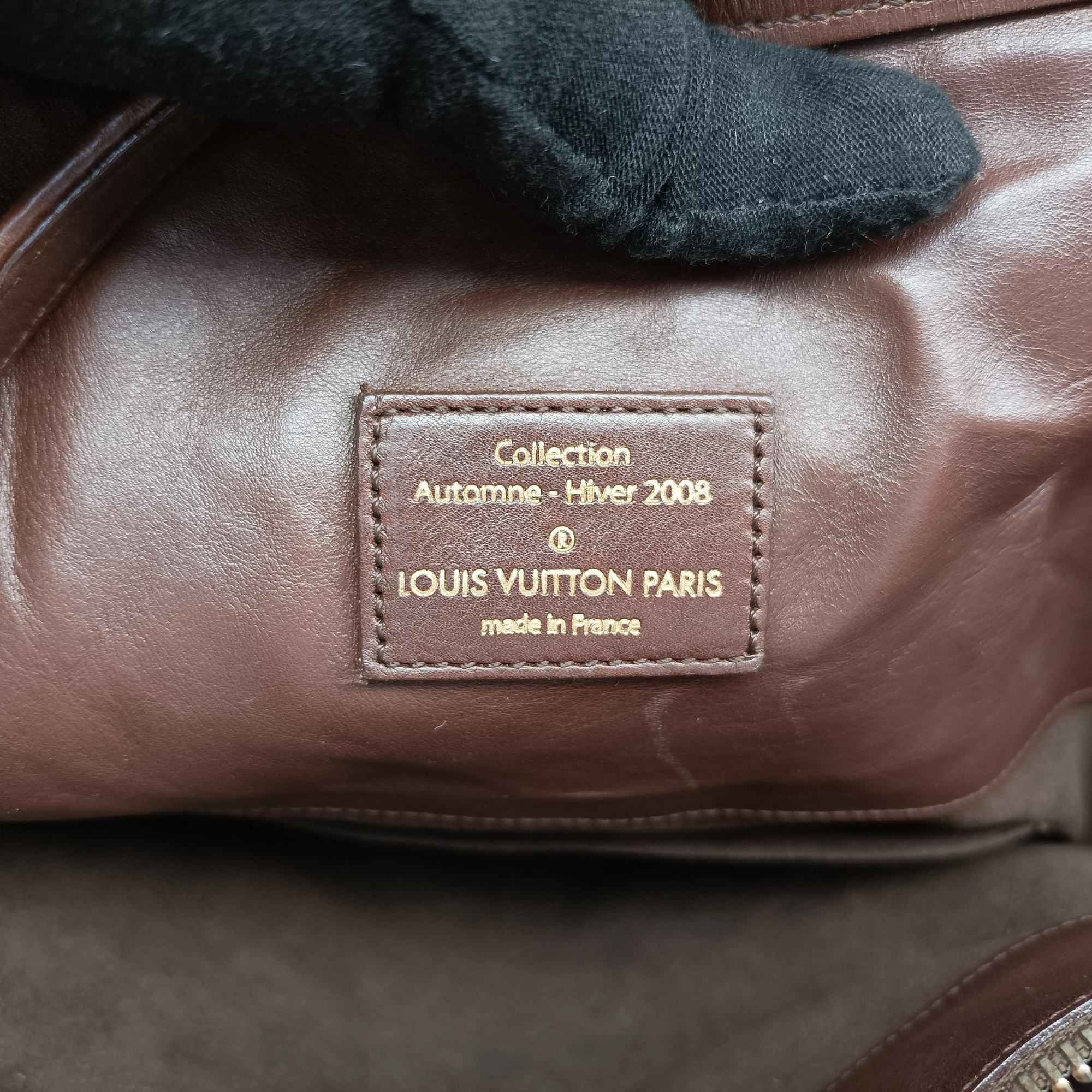 Secondhand Louis Vuitton Whisper Moka Monogram Paris Souple Leather M95828 shoulderbag | stylenewstar