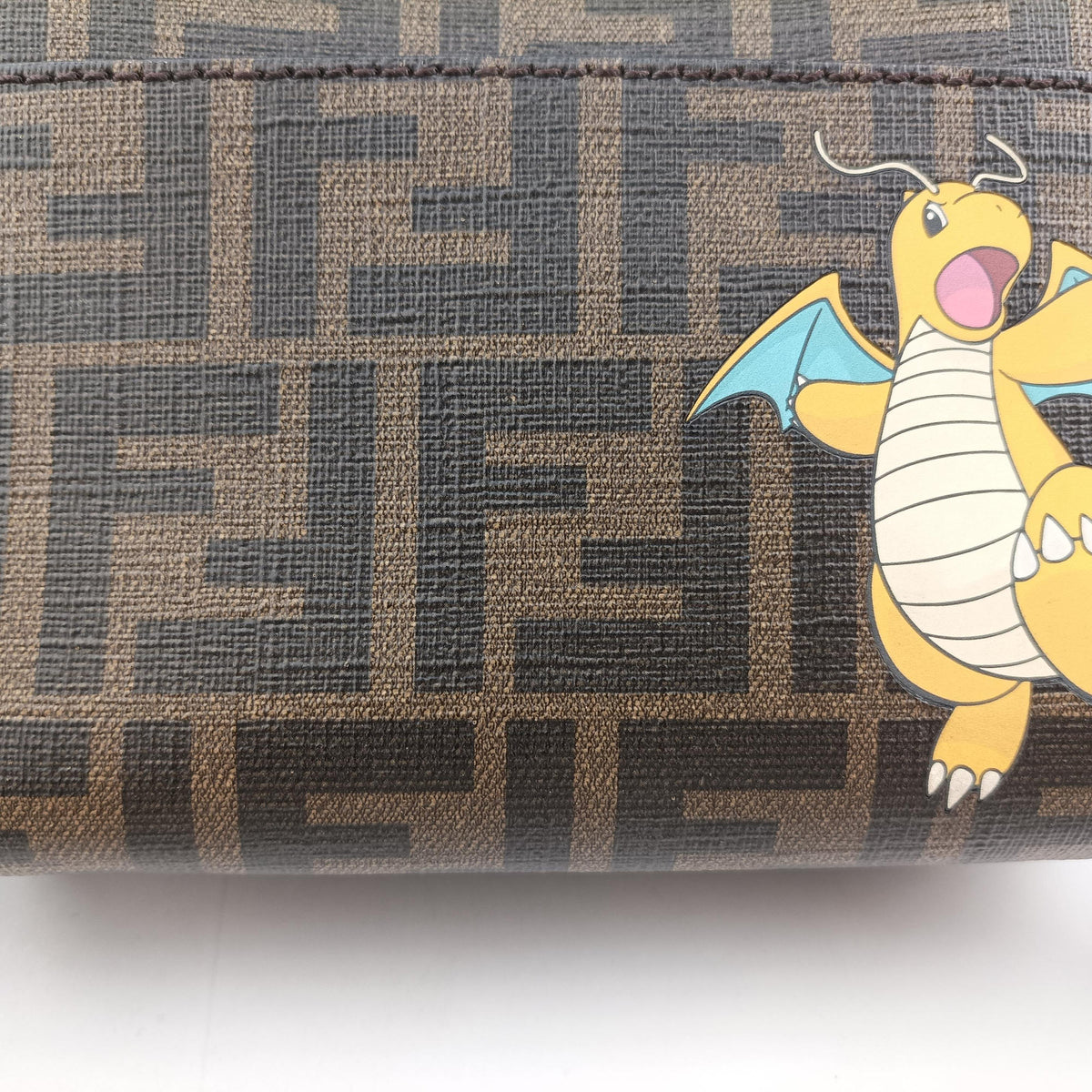 Pre-owned Fendi Pokemon collaboration Dragonite Organizer Cam FF Brown canvas 7M0357 shoulderbag | stylenewstar